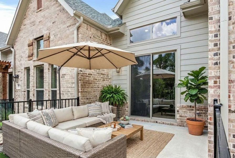 Exterior details and patio area of a home in Cottonwood Creek, Rowlett (Image 28).