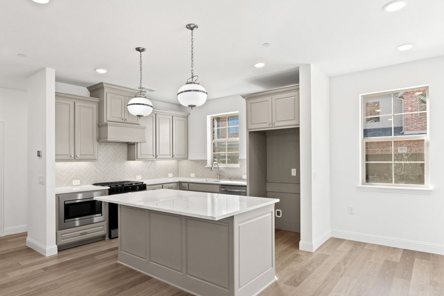 Furnished interior view inside a new home in The Tribute, The Colony (Image 7).