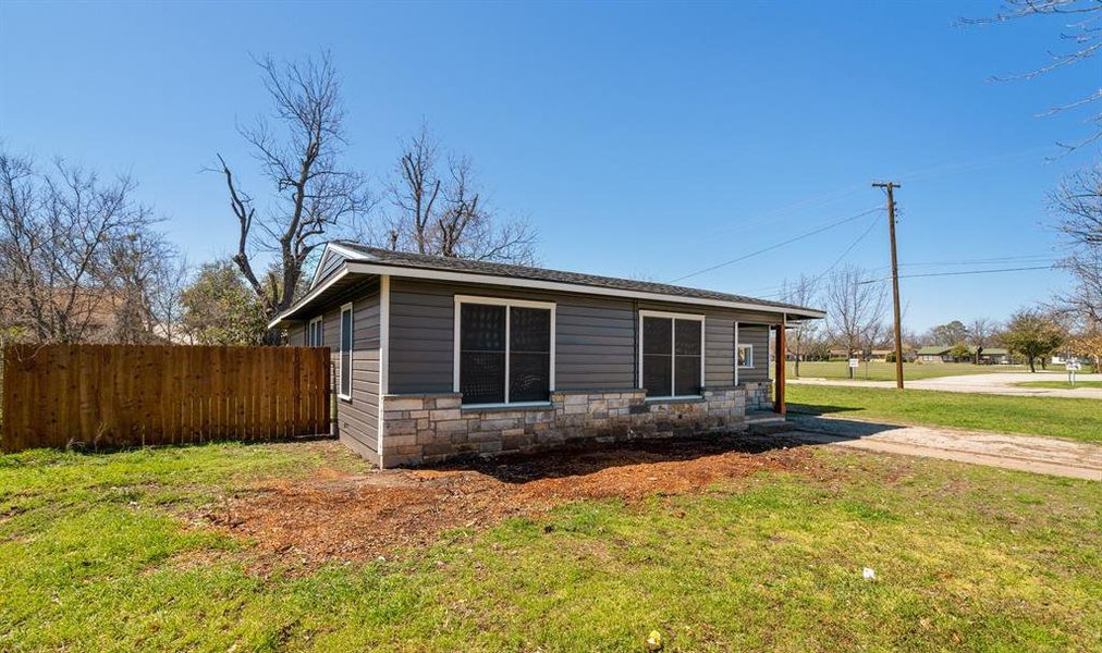 Exterior details and patio area of a home in , Brownwood (Image 16).