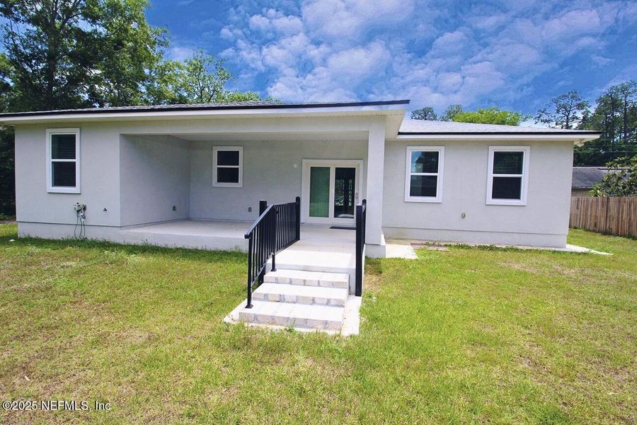 Front exterior of a new home in , Jacksonville, FL, highlighting curb appeal (Image 15).