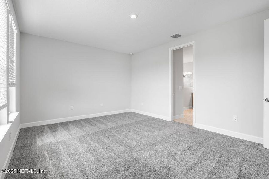 Spacious, unfurnished interior of a new home in Colbert Landings, Palm Coast (Image 12).