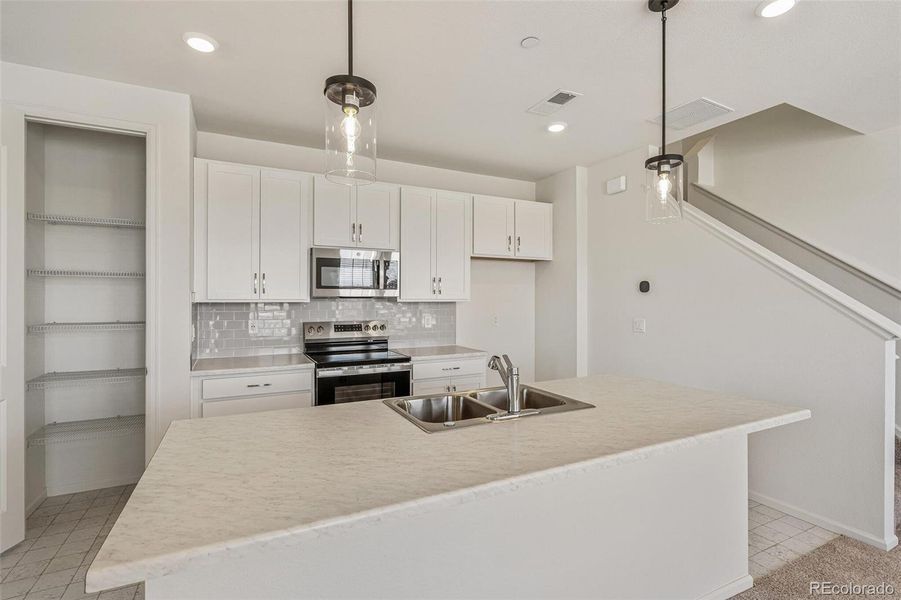 Furnished interior view inside a new home in Turnberry, Commerce City (Image 9). Furnished interior view inside a new home in Turnberry, Commerce City (Image 9).