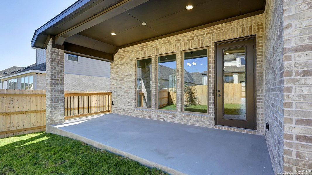 Exterior details and patio area of a home in Corley Farms 50', Boerne (Image 21).