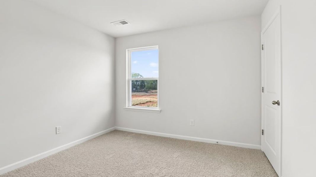 Spacious, unfurnished interior of a new home in Varner Station, Woodruff (Image 24).