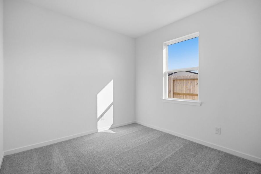 Spacious, unfurnished interior of a new home in Raburn Reserve 50s, Tomball (Image 11).