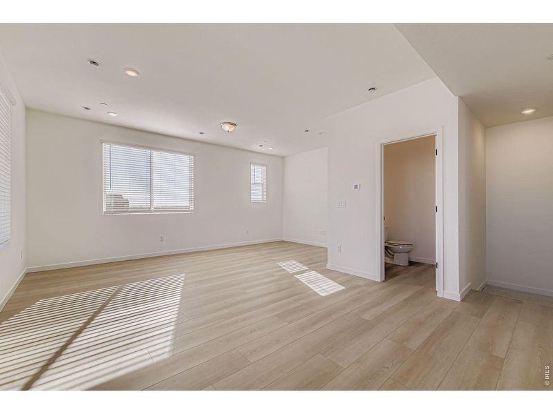 Spacious, unfurnished interior of a new home in Parkside West at Baseline, Broomfield (Image 23).