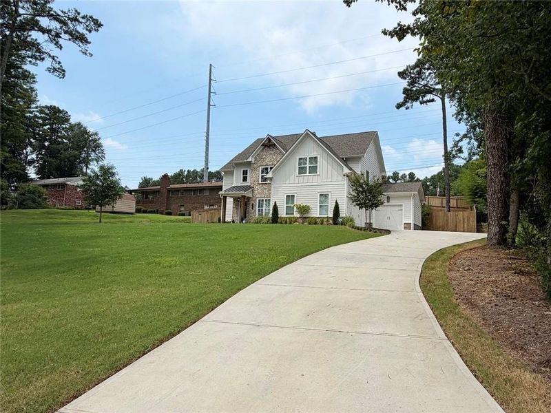 Front exterior of a new home in , Marietta, GA, highlighting curb appeal (Image 25).