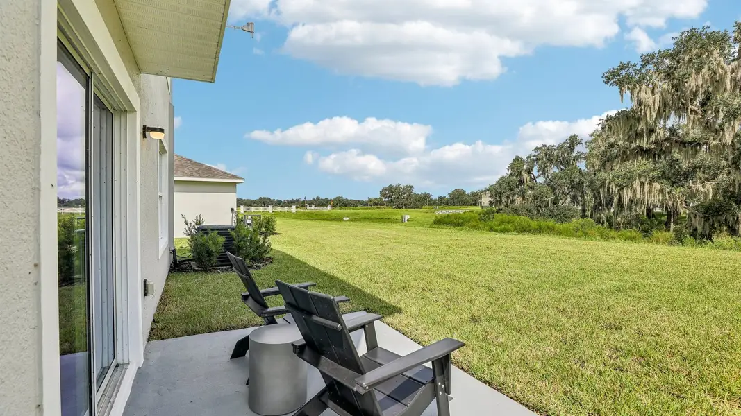 Exterior details and patio area of a home in Farm at Varrea, Plant City (Image 3).