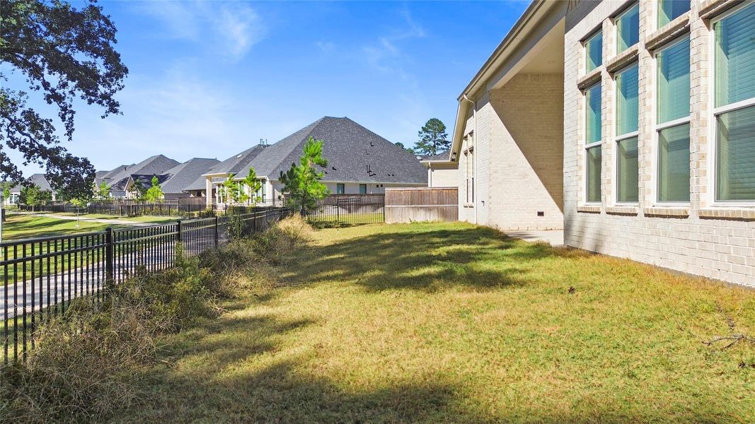 Exterior details and patio area of a home in Audubon Park 70', Magnolia (Image 14).