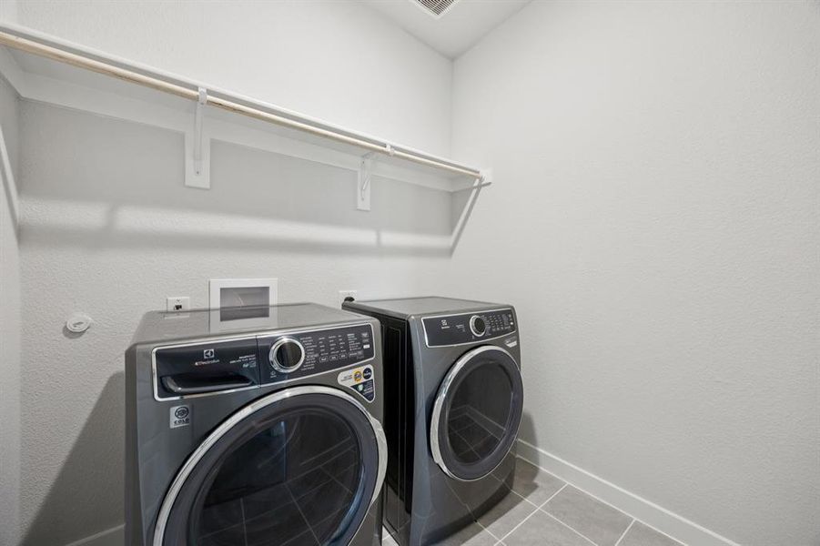 Utility Room in the Haylee home plan by Trophy Signature Homes - REPRESENTATIVE PHOTO