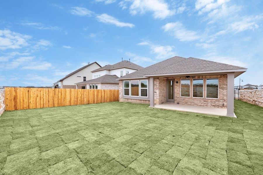 Front exterior of a new home in Santa Rita Ranch, Liberty Hill, TX, highlighting curb appeal (Image 17). Front exterior of a new home in Santa Rita Ranch, Liberty Hill, TX, highlighting curb appeal (Image 17).