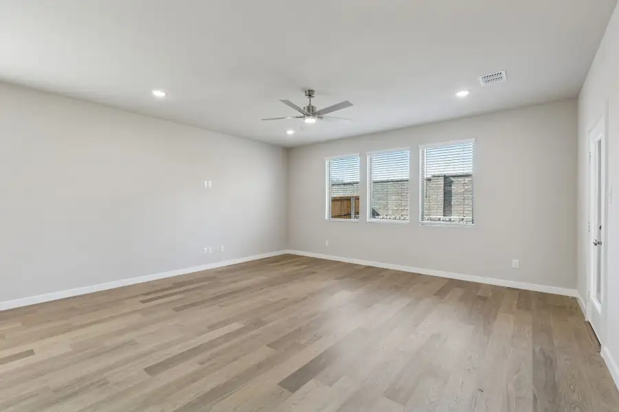 Living Room in the Holden home plan by Trophy Signature Homes – REPRESENTATIVE PHOTO