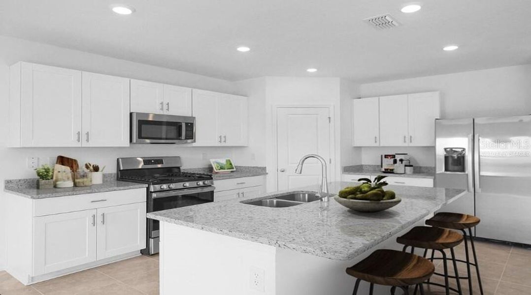 Furnished interior view inside a new home in Waterstone, Groveland (Image 3). Furnished interior view inside a new home in Waterstone, Groveland (Image 3).