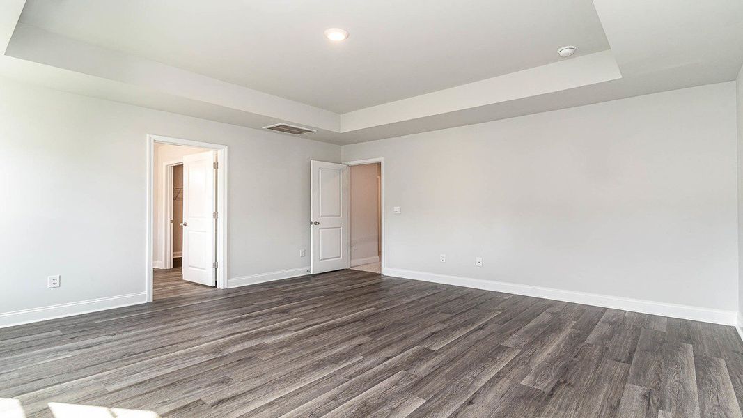 Representative unfurnished interior of a home built from the FORRESTER by D.R. Horton in Haven View, Murrells Inlet (Image 27).