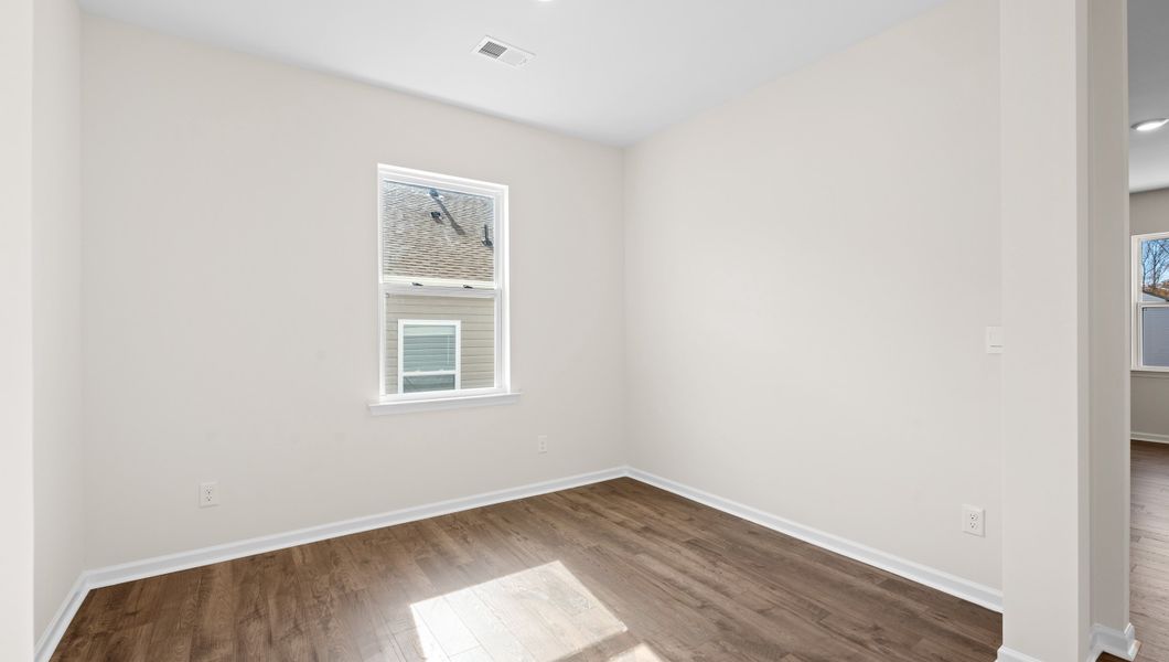 Representative unfurnished interior of a home built from the Biltmore by D.R. Horton in Hunters Ridge, Woodruff (Image 17).