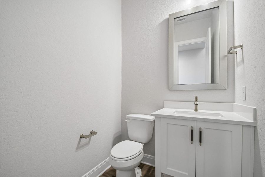 Furnished interior view inside a new home in 6 Creeks, Kyle (Image 4).