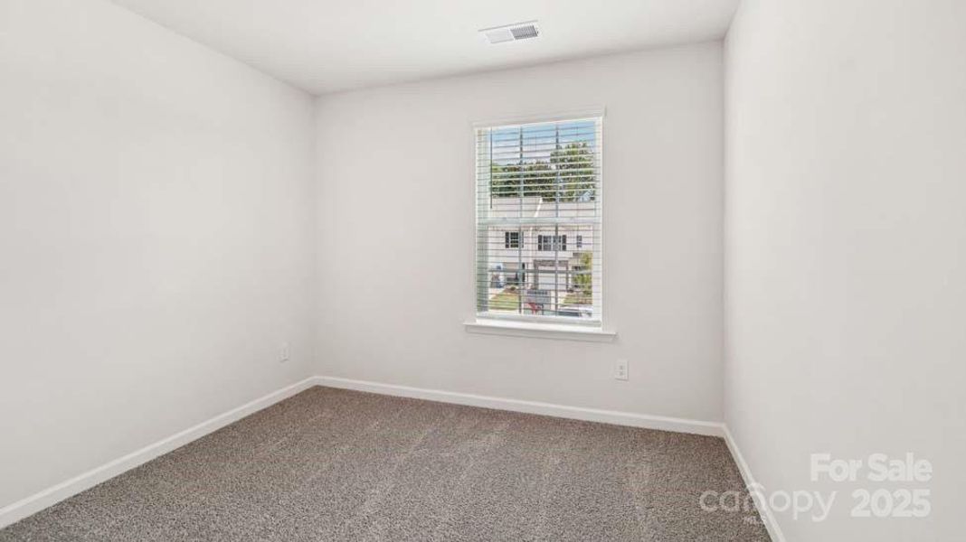 Spacious, unfurnished interior of a new home in Mallard Creek Townhomes, Charlotte (Image 9). Spacious, unfurnished interior of a new home in Mallard Creek Townhomes, Charlotte (Image 9).