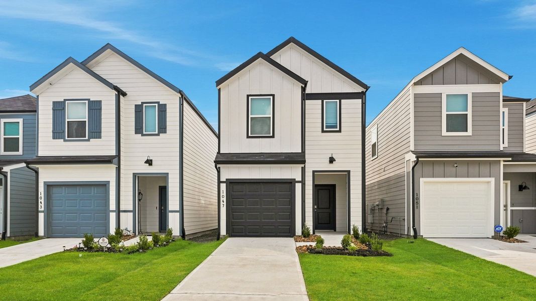 Front exterior of a new home in The Villas at Legacy Park, Houston, TX, highlighting curb appeal (Image 1). Front exterior of a new home in The Villas at Legacy Park, Houston, TX, highlighting curb appeal (Image 1).