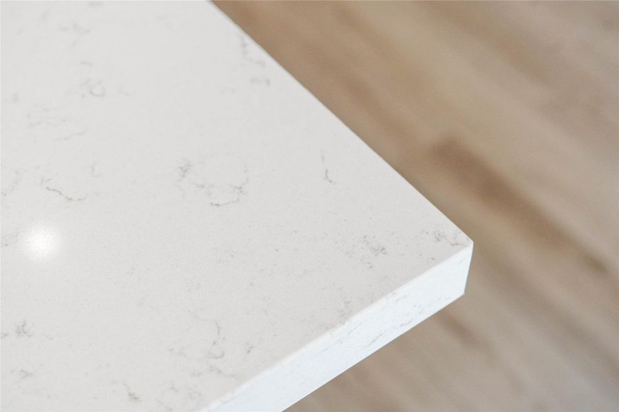 Quartz is incredibly tough and engineered to resist scratches, chips, and cracks from daily wear and tear. This ensures the surface retains its pristine condition for decades.