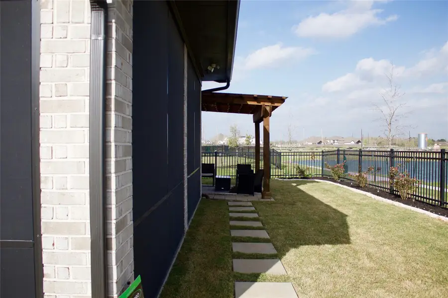 Exterior details and patio area of a home in , Manvel (Image 3).