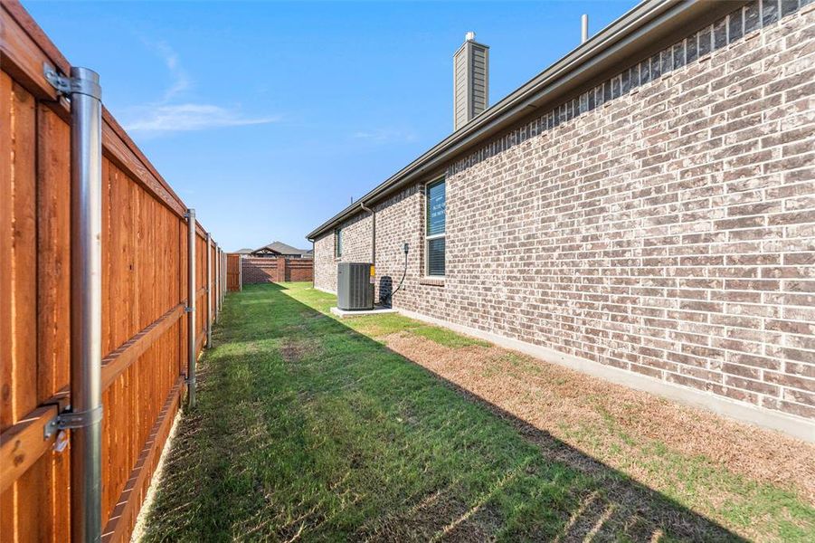 Exterior details and patio area of a home in Northstar, Fort Worth (Image 24).