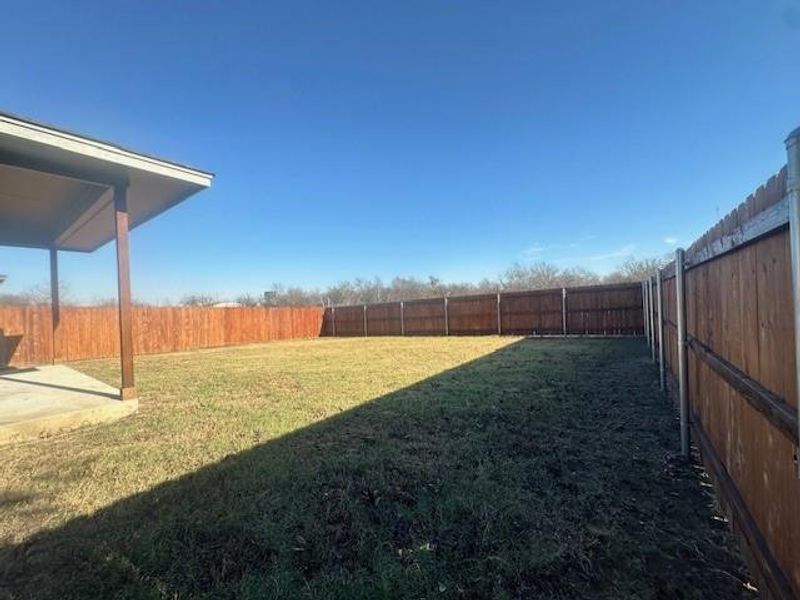 Exterior details and patio area of a home in , McGregor (Image 15).