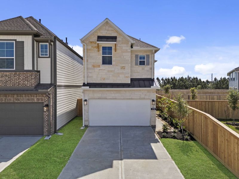Front exterior of a new home in Bridgeland, Cypress, TX, highlighting curb appeal (Image 23).