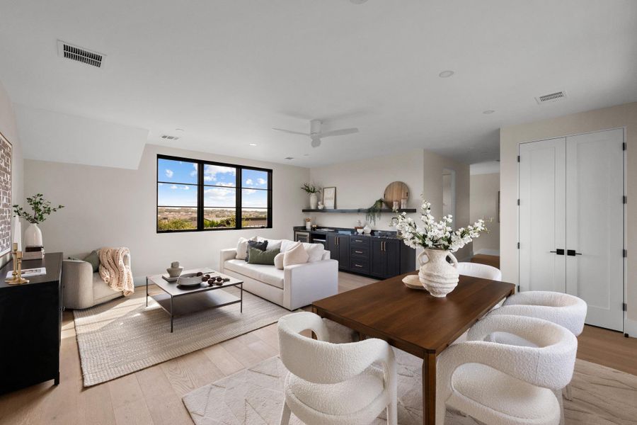 Ascend the first staircase to a fully self-contained upper loft, presenting an entirely separate living experience