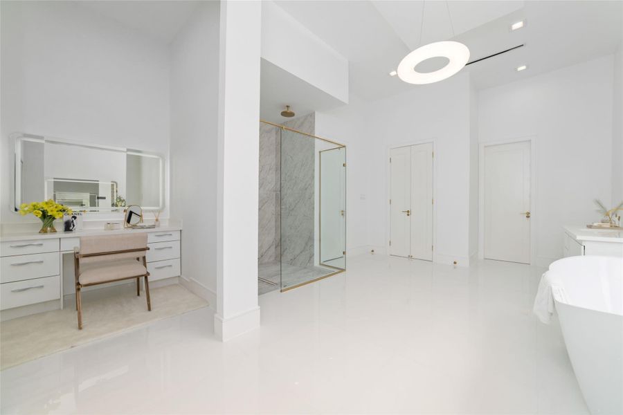 Luxury materials and timeless design define the space.