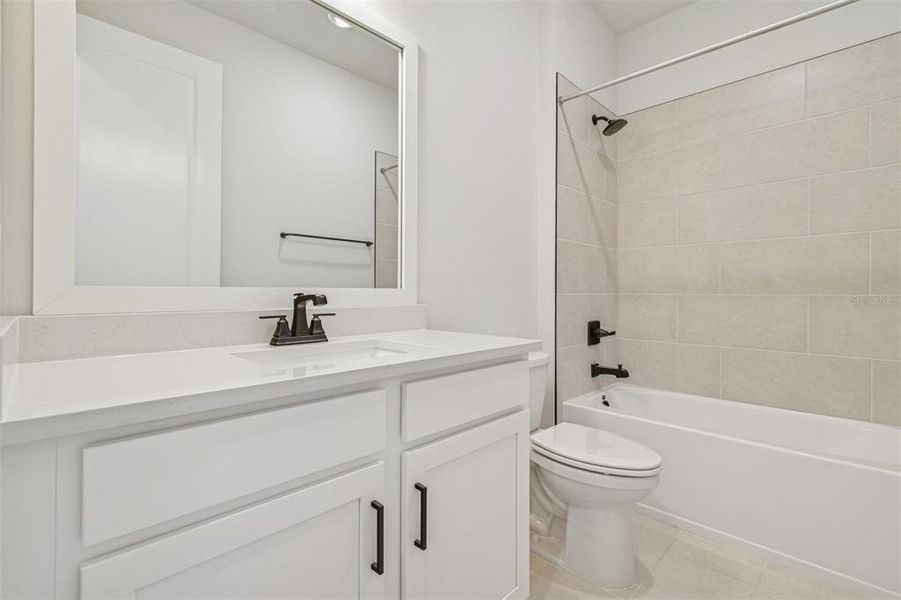 Furnished interior view inside a new home in The Peninsula at Rhodine Lake, Riverview (Image 18).