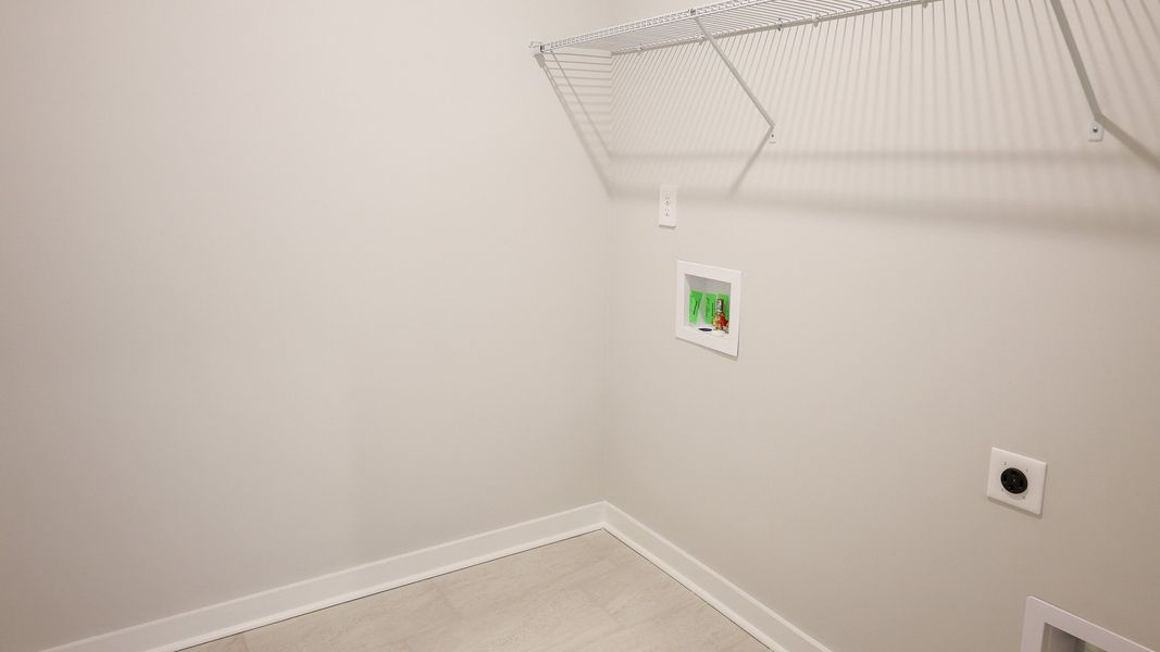 Representative unfurnished interior of a home built from the EMBRY by D.R. Horton in Harvest Point, Spring Hill (Image 29).