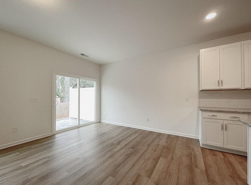 Spacious, unfurnished interior of a new home in East Main Townes, Spartanburg (Image 14).