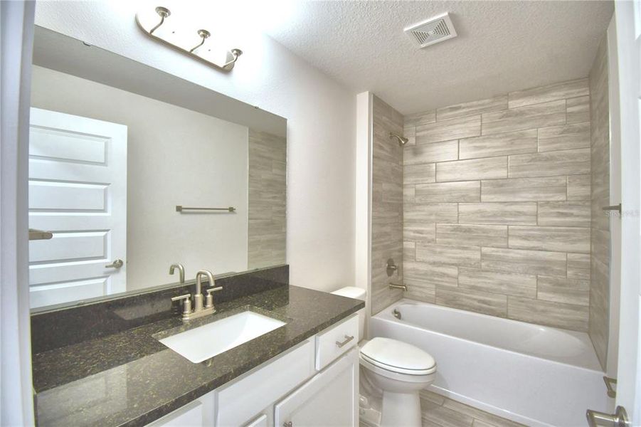 Furnished interior view inside a new home in , Auburndale (Image 11).