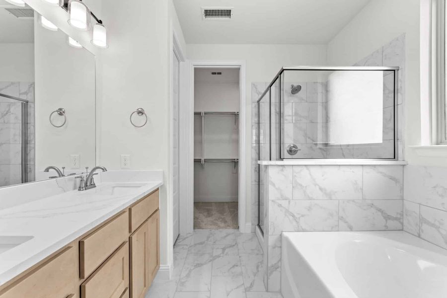 Representative furnished interior of a home built from the Willow by UnionMain Homes in Edgewater, Fate (Image 7).