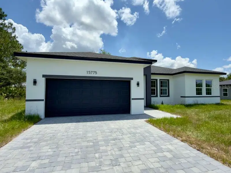 Front exterior of a new home in , Ocala, FL, highlighting curb appeal (Image 26).