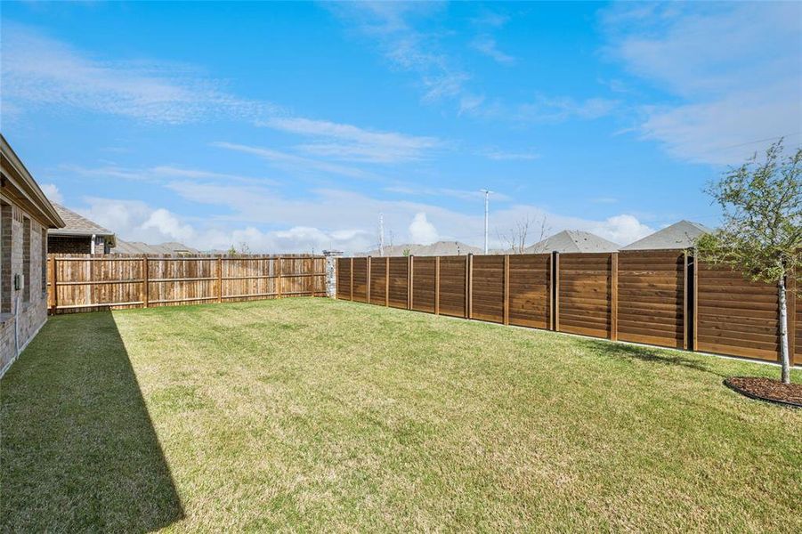 Exterior details and patio area of a home in , Providence Village (Image 22).
