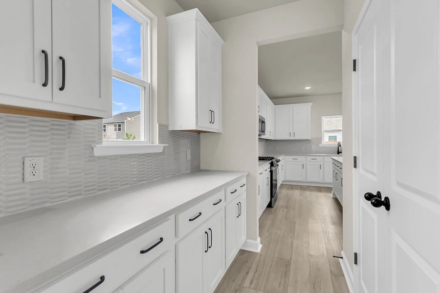 Furnished interior view inside a new home in Watson Hill, Summerville (Image 6).