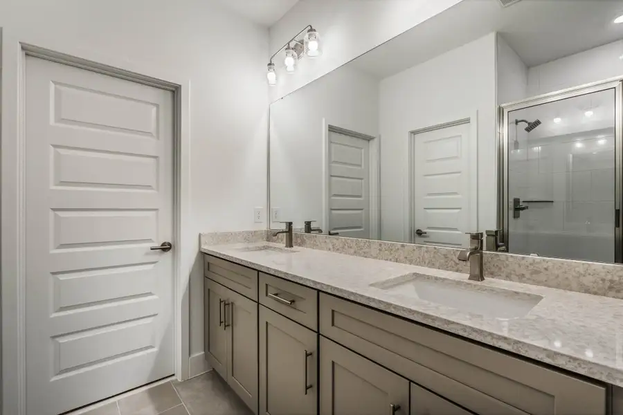 Furnished interior view inside a new home in Harvest at Ovation - Townhomes, Winter Garden (Image 11).