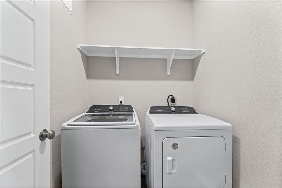 Laundry area with washing machine and dryer Laundry area with washing machine and dryer