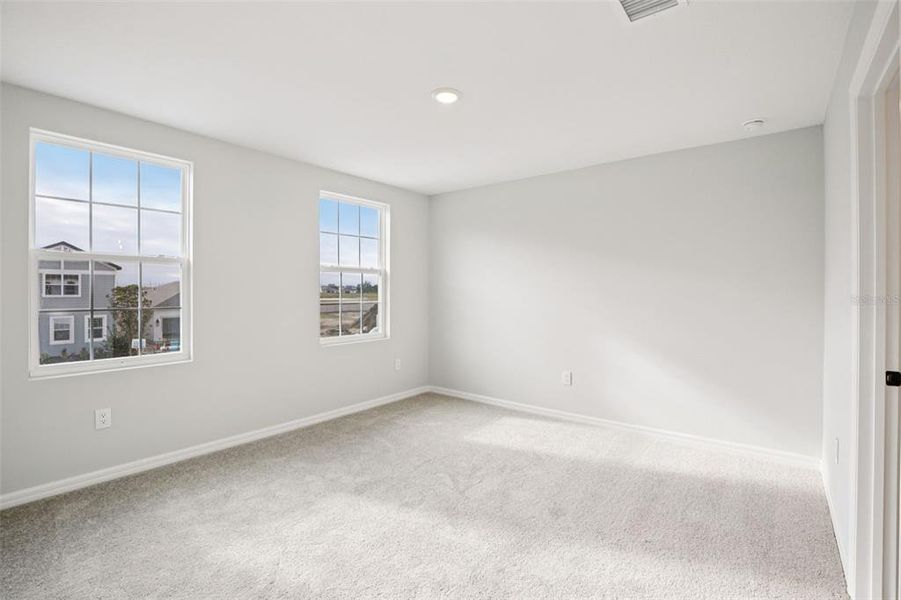 Spacious, unfurnished interior of a new home in Oakfield Trails, Parrish (Image 14).