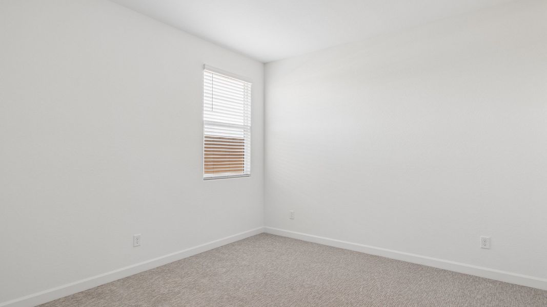 Spacious, unfurnished interior of a new home in Radiance at Superstition Vistas, Apache Junction (Image 32).