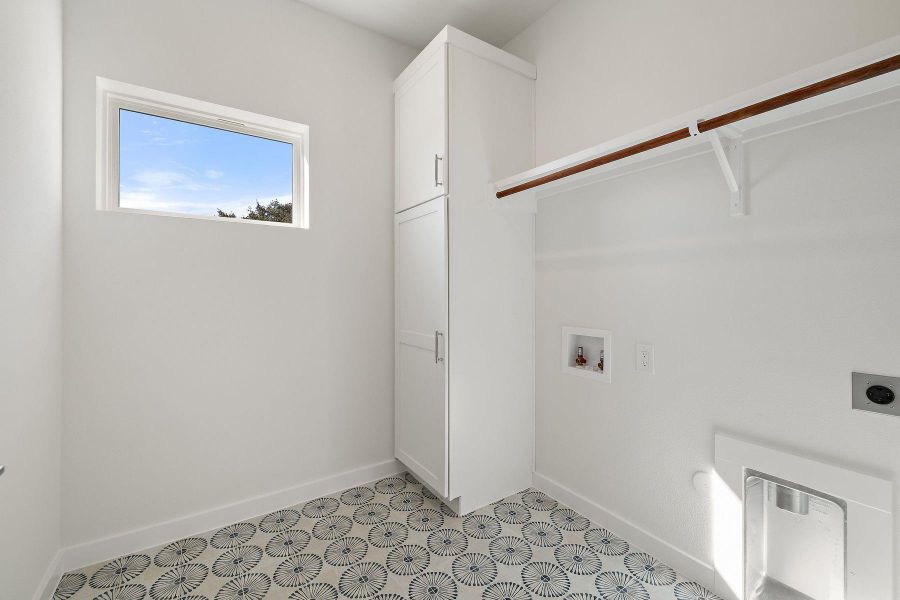 Laundry with built in linen closet