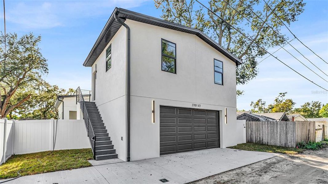Front exterior of a new home in , St. Petersburg, FL, highlighting curb appeal (Image 20).