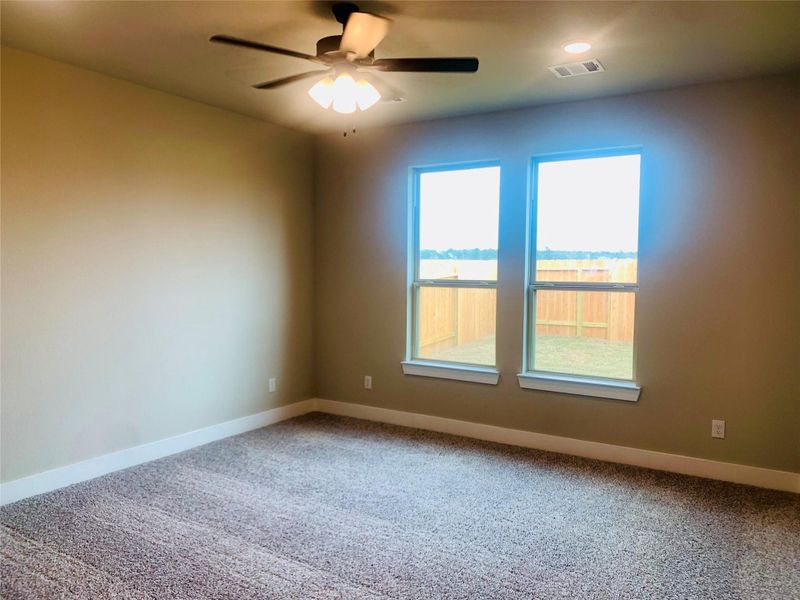 Spacious, unfurnished interior of a new home in Harrington Trails, New Caney (Image 12).