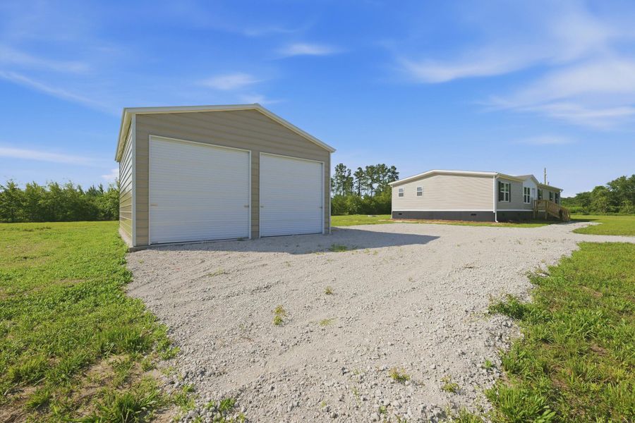 Exterior details and patio area of a home in , Cross (Image 20).