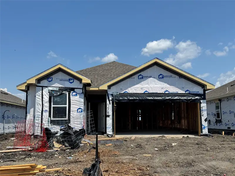 One story home with 4 bedrooms, 3 bathrooms, and 2 car garage.