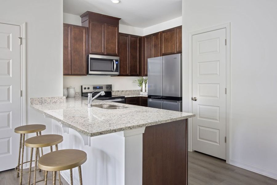Representative furnished interior of a home built from the 1155 Modeled by KB Home in Aster Ridge, Durham (Image 7).