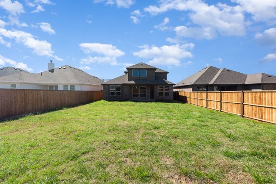 Exterior details and patio area of a home in Courts Of Bonnie Brae, Denton (Image 4).
