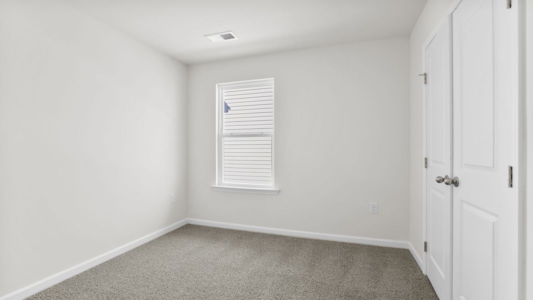 Spacious, unfurnished interior of a new home in Village Grove, Greenville (Image 19).