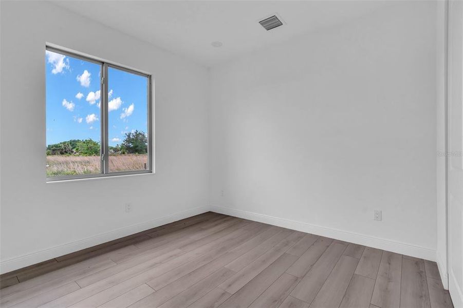 Spacious, unfurnished interior of a new home in , Okeechobee (Image 20).
